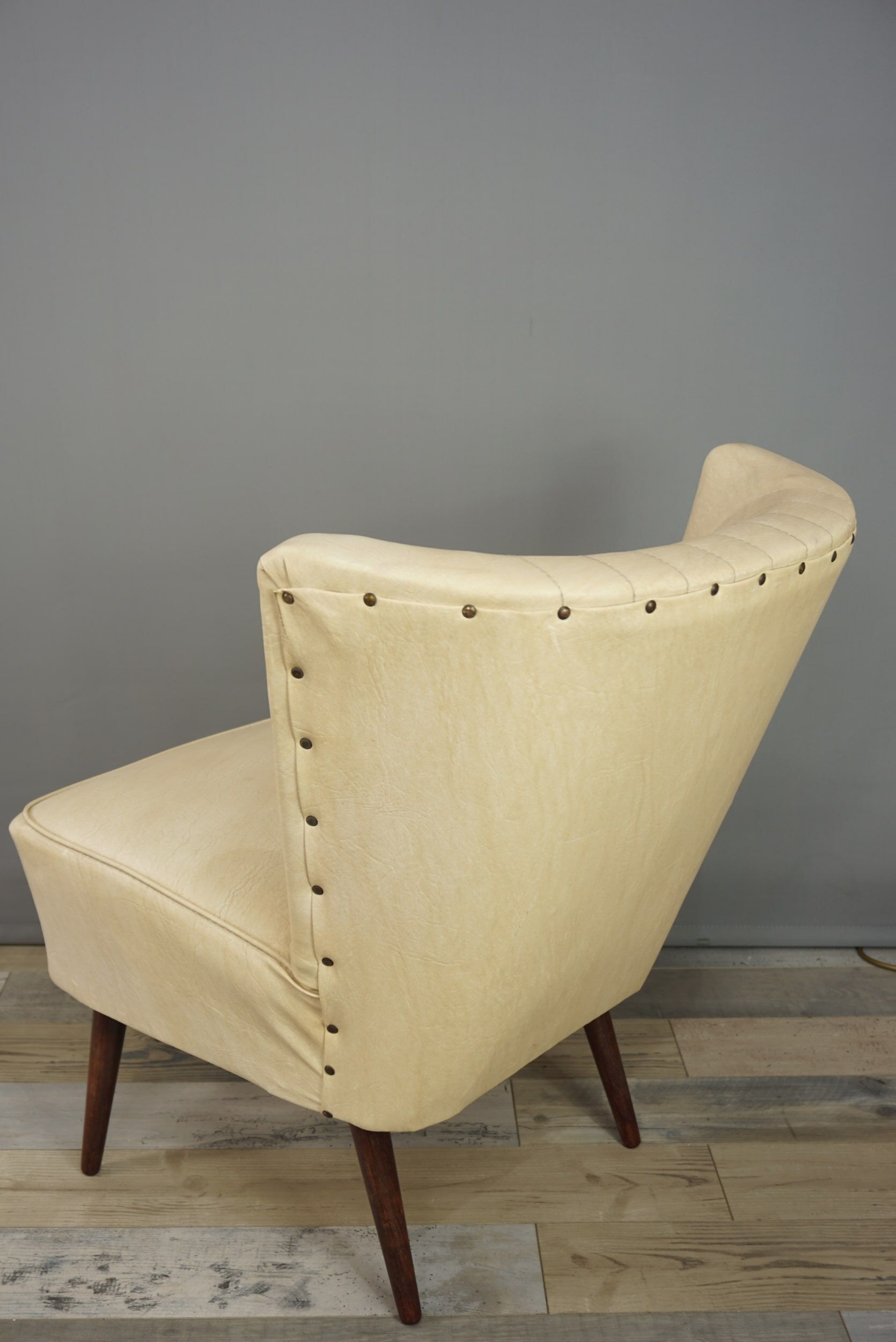 Cocktail armchair 50s in wood and imitation leather