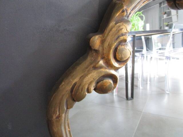 Miroir ancien en bois et stuc doré