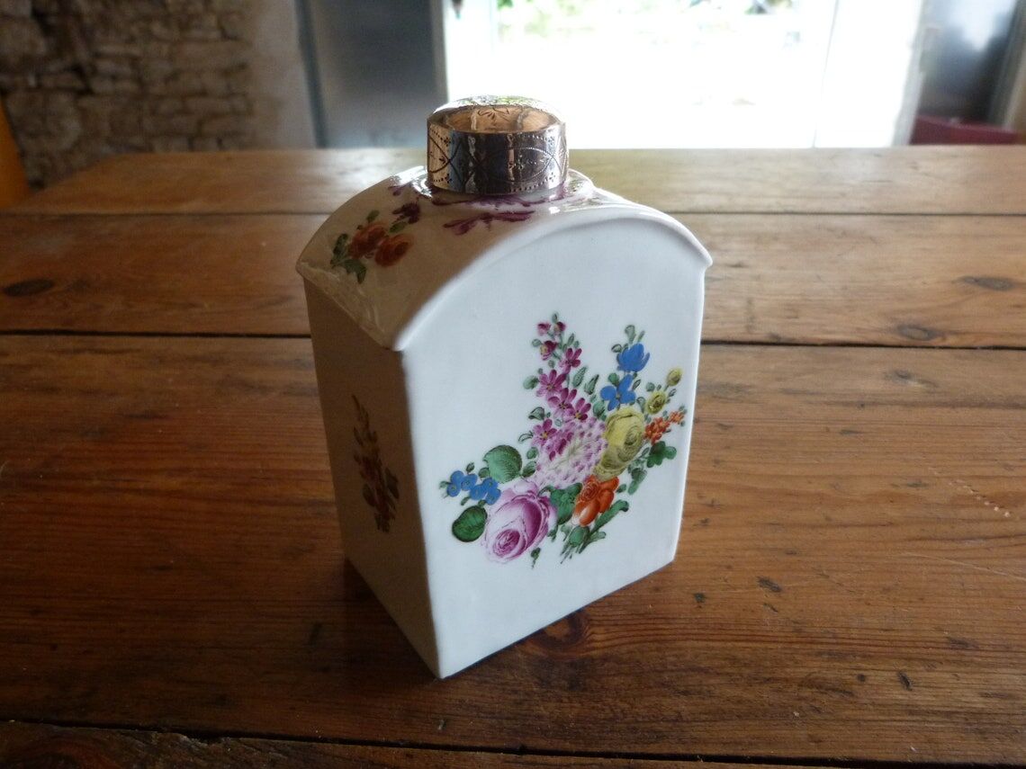 Floral porcelain bathroom bottle with engraved silver cap