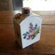 Floral porcelain bathroom bottle with engraved silver cap