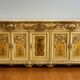 Curved Louis XV Venetian buffet in lacquered, painted, and gilded wood.