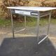 Vintage table with square chrome tubular metal base and marble top with 1 drawer.