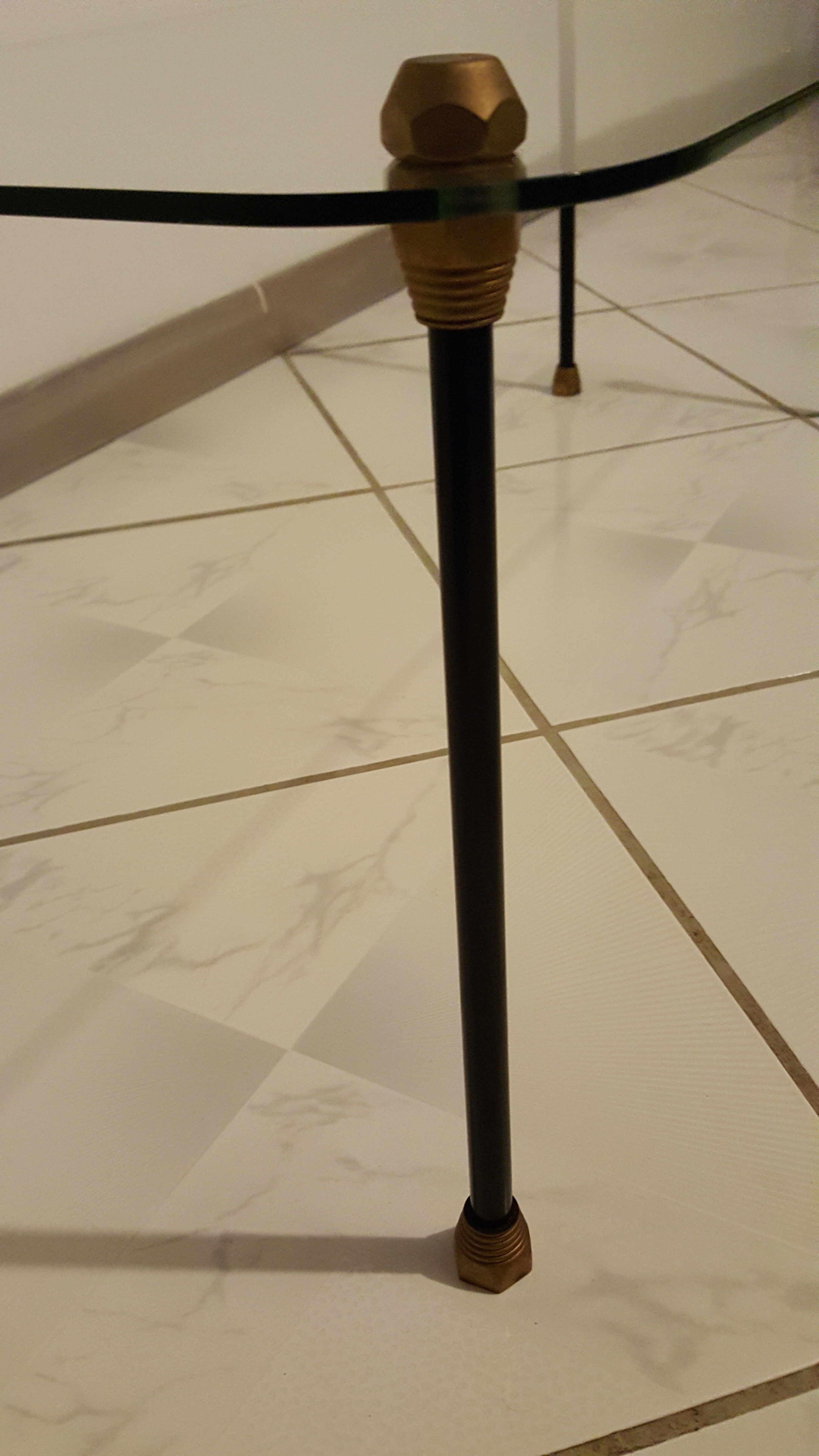 Glass table with brass tip