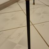 Glass table with brass tip