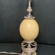 Old lamp foot silver metal and ostrich egg late nineteenth century