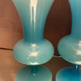 Two vases on a pedestal in blue opaline