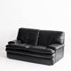 Black leather two-seater sofa. Roche Bobois edition. France, 1980s.
