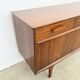 Teak Jentique sideboard — 1 door, 2 drawers & drop-down bar, England 1950s-60s