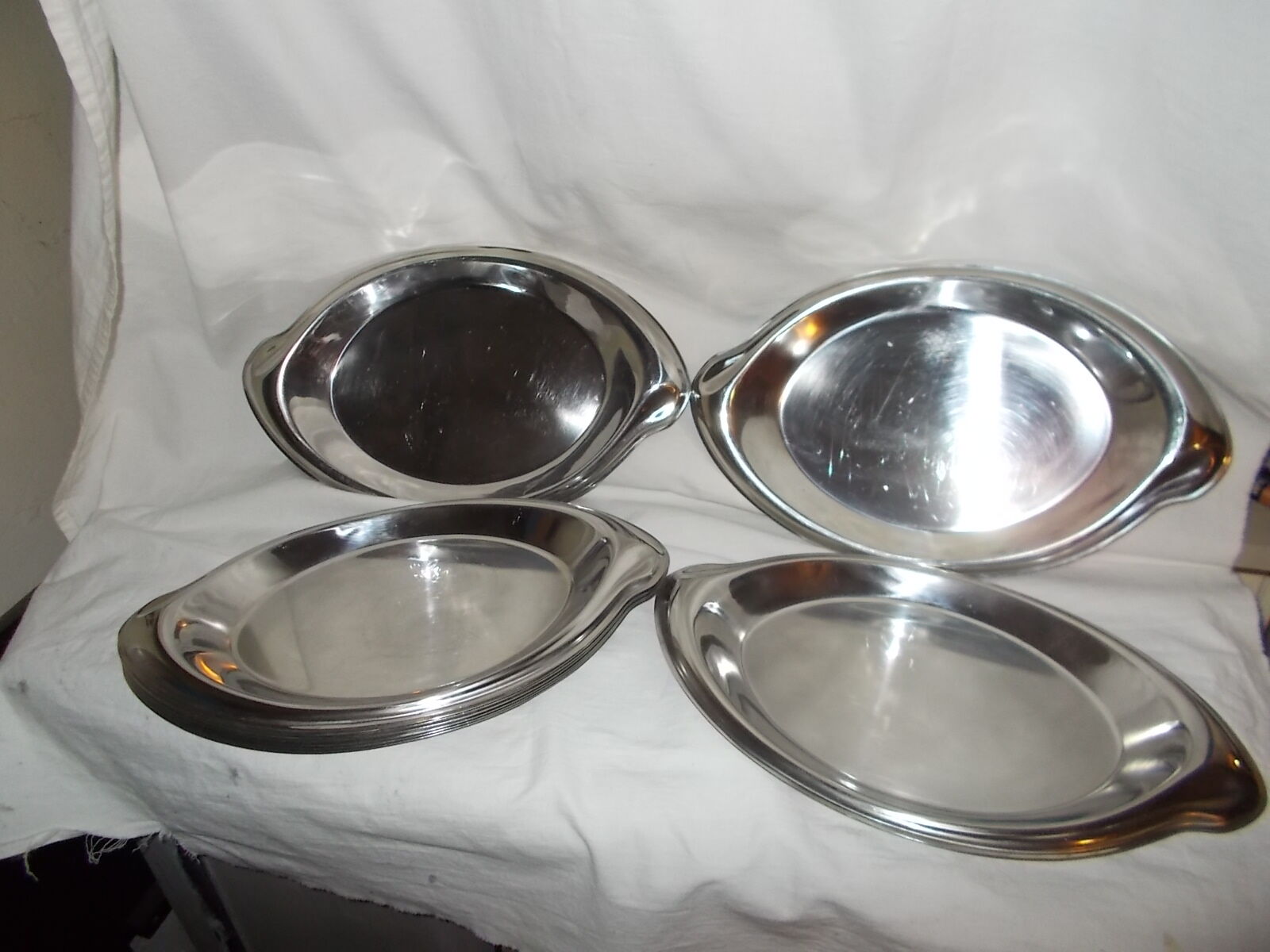 Lot of 10 oval stainless steel dishes