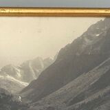 Photo in black and white mountain lake in golden frame