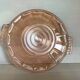 Pink glass plate with handles in Rosaline style.