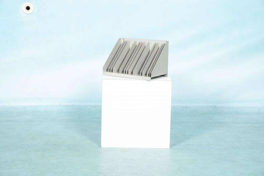 Vintage 1960s metal magazine rack, storage for single LPs.