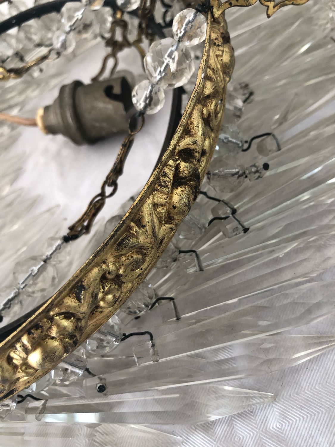 Vintage tassel chandelier has 2 glass and brass crowns