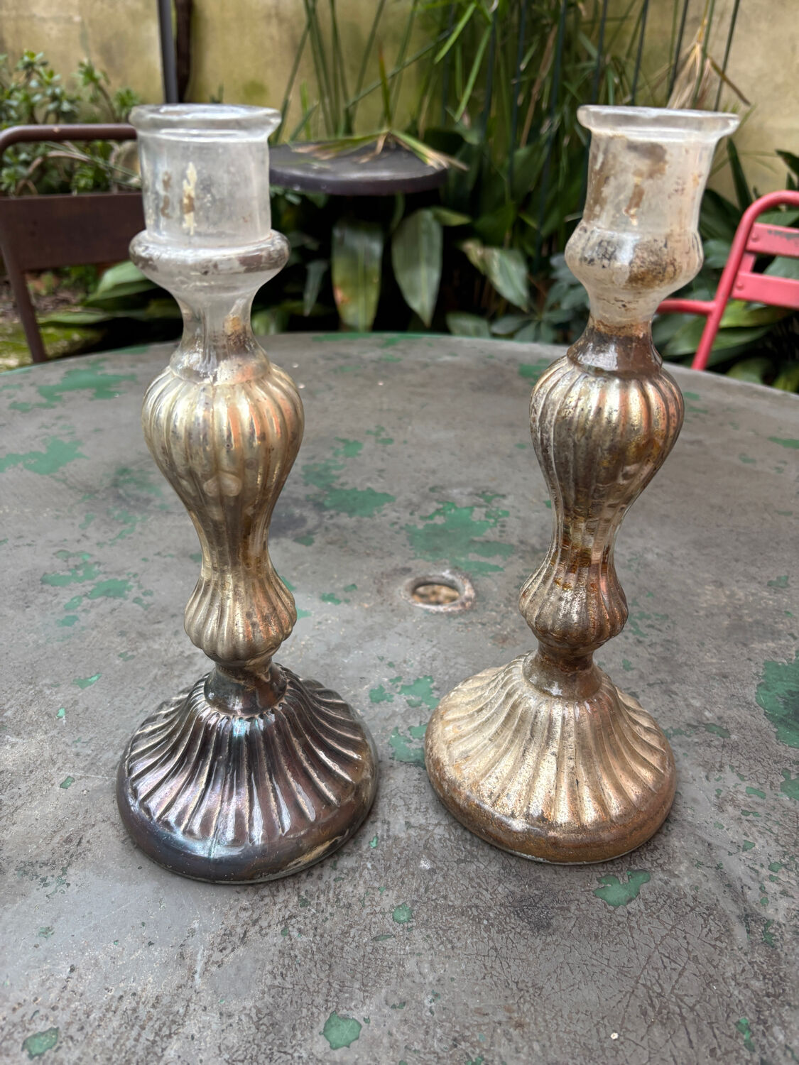 Pair of eglomisé candlesticks