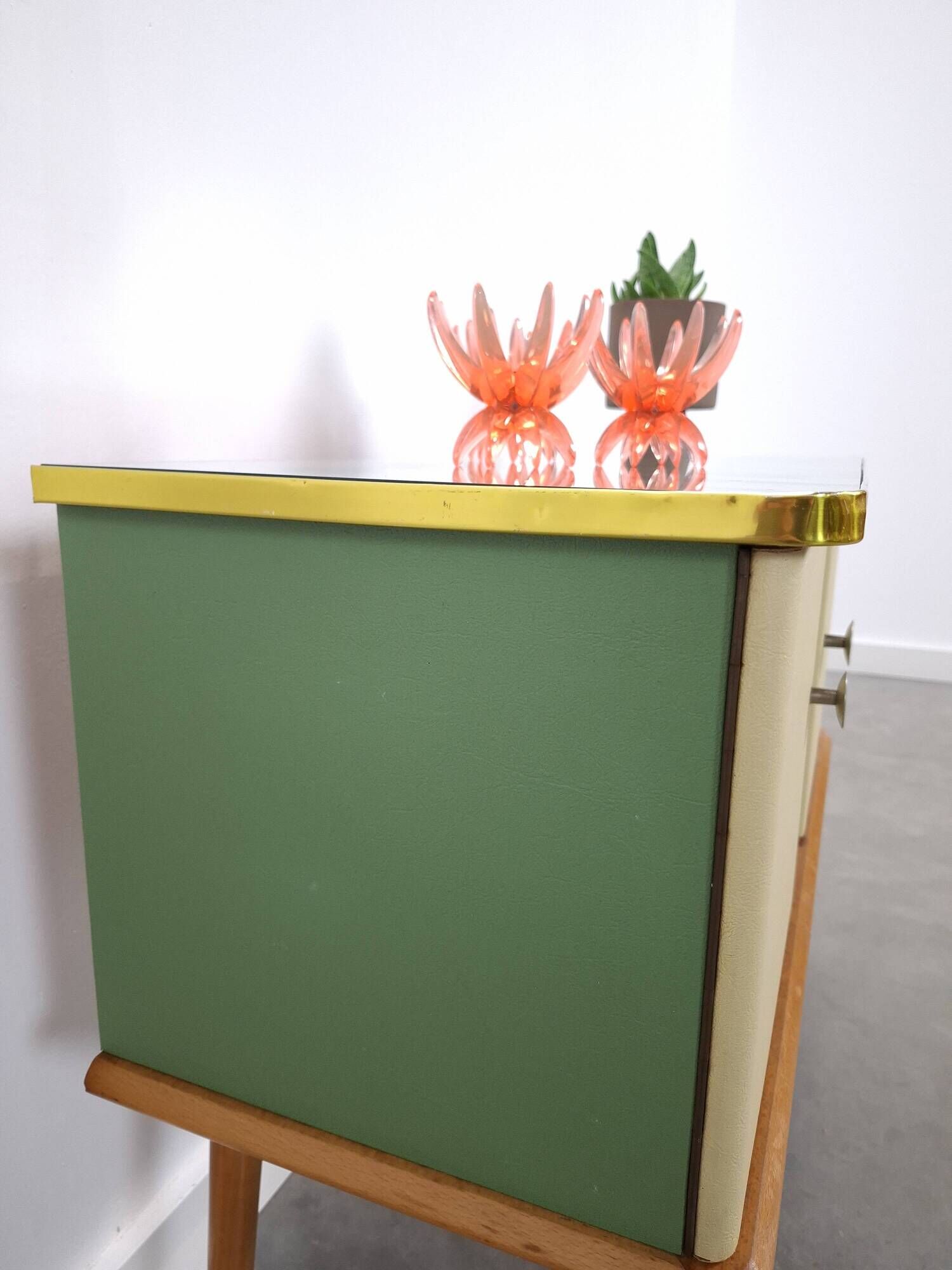 Vintage green DDR cabinet, model Libelle with glass top, slanted legs.