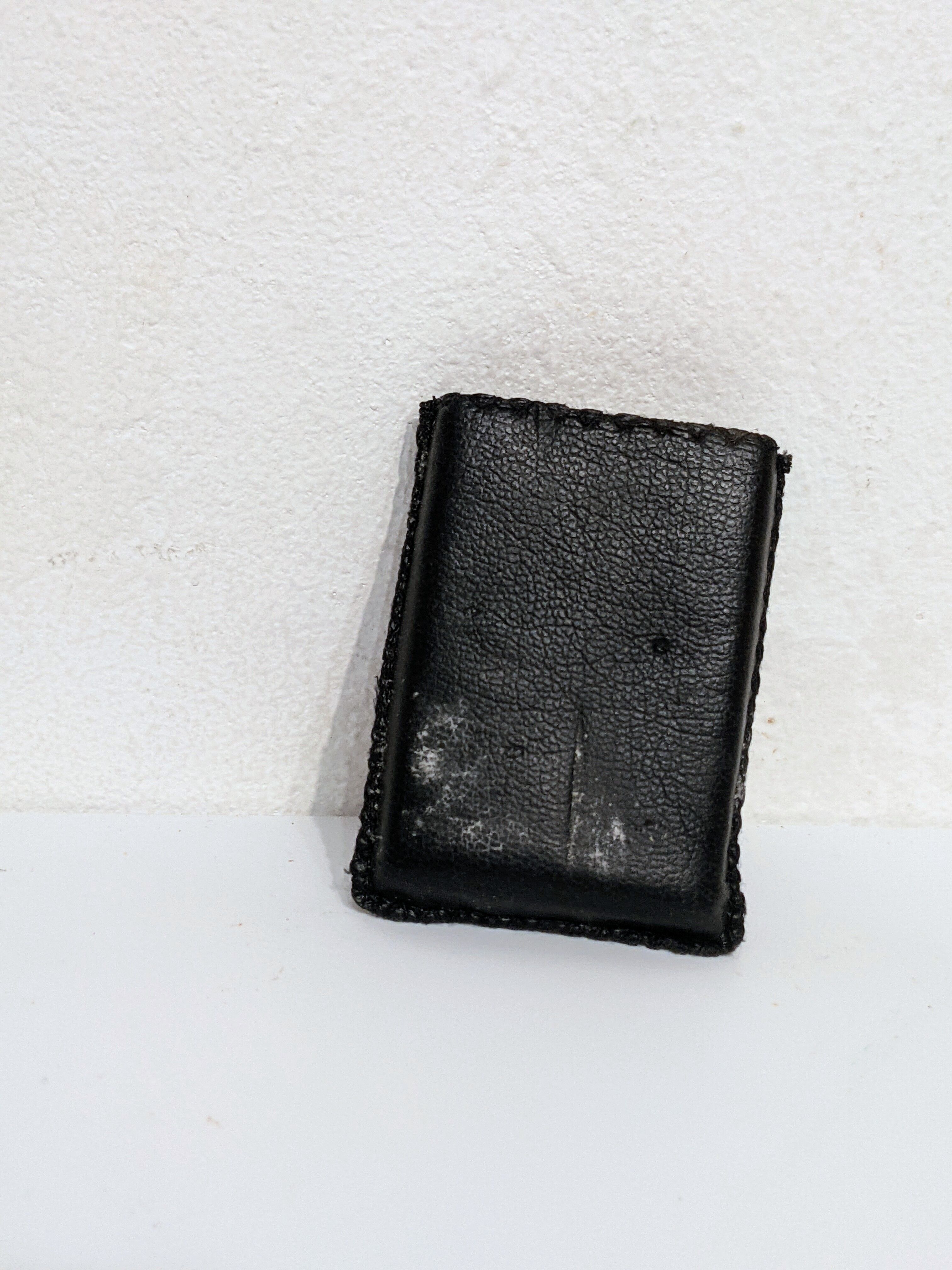 Old lighter new picoflam new condition in its small pocket leather case some stains on the et