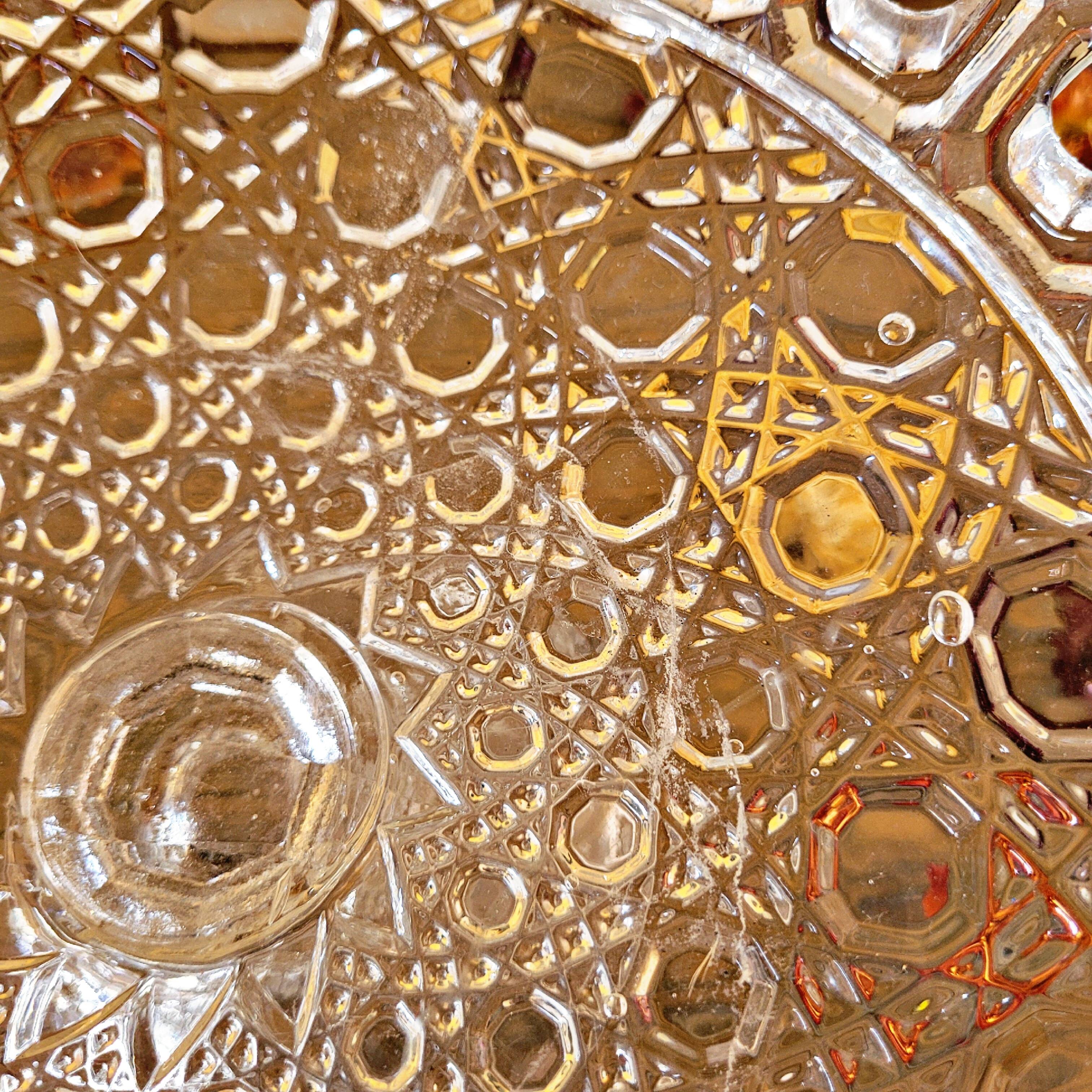 Molded glass compote bowl, geometric decoration