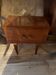 Vintage varnished wooden bedside table