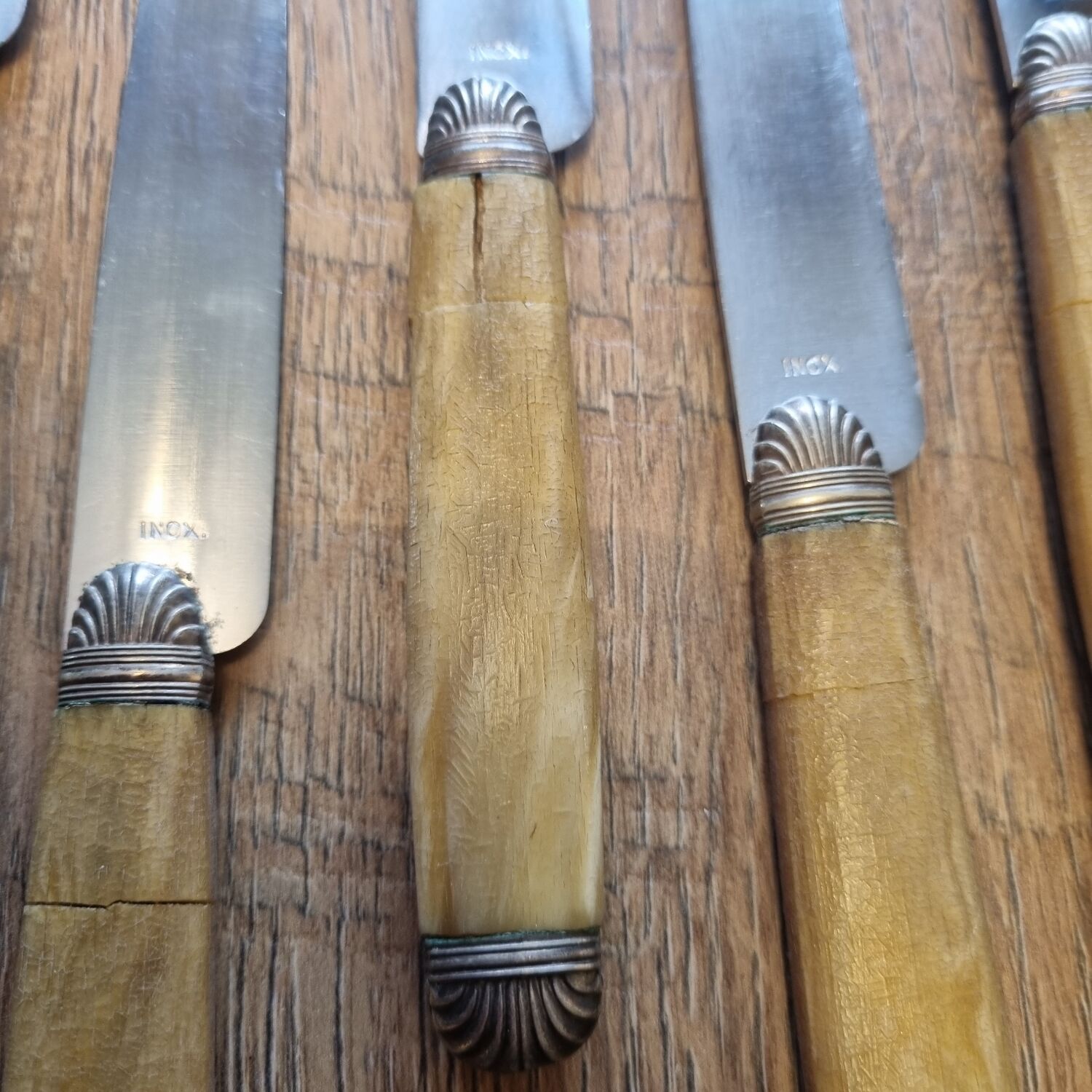 11 horn and silver knives from 1940