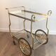 Neo-classical table in gilded metal and glass