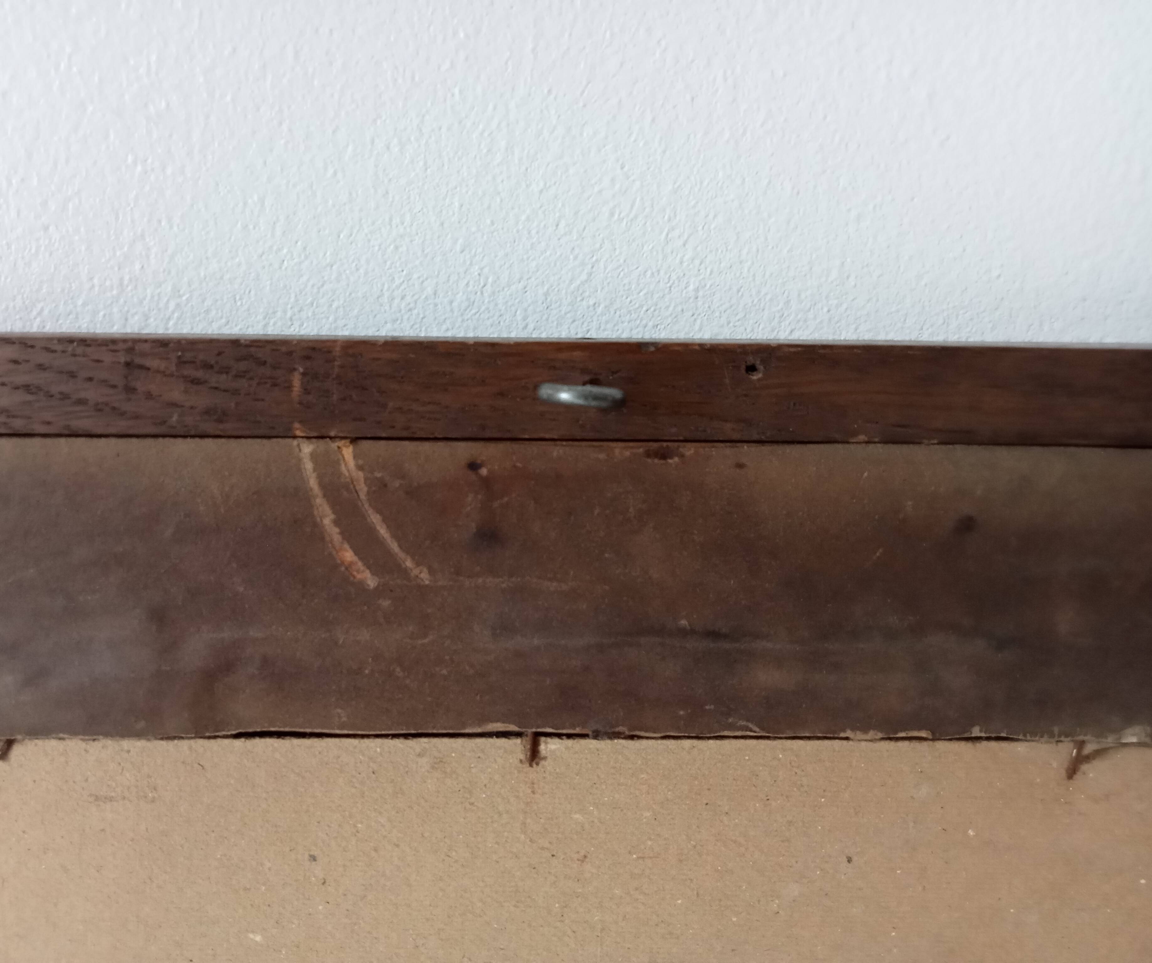 Antique mirror in carved wood