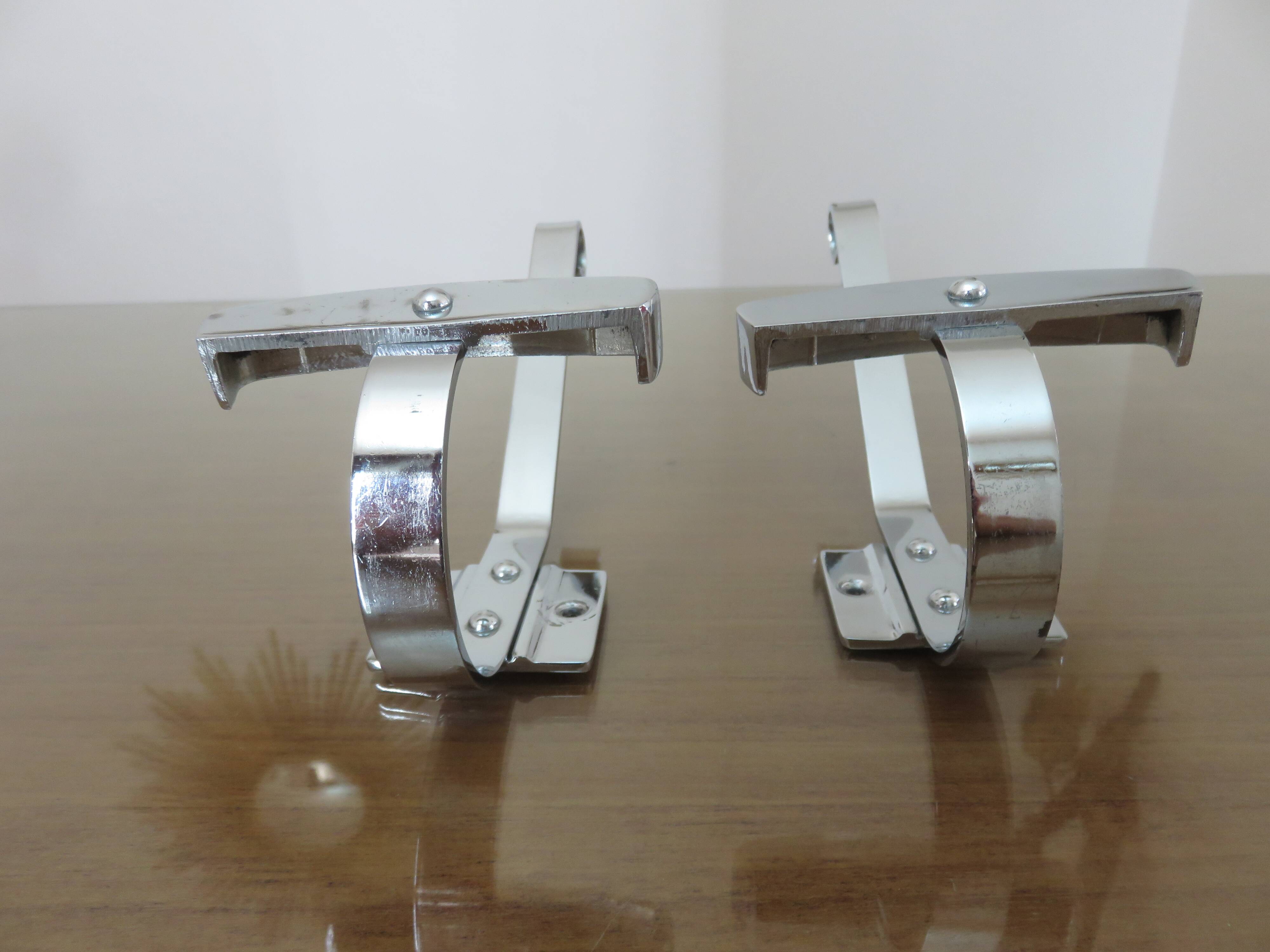 Pair of chrome metal coat hooks from the 1970s.