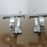 Pair of chrome metal coat hooks from the 1970s.