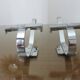 Pair of chrome metal coat hooks from the 1970s.