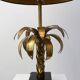 Hollywood Regency brass palm tree table lamp with black shade, France, 1970