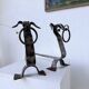 Paire de chenets zoomorphes métal « chiens » 1950