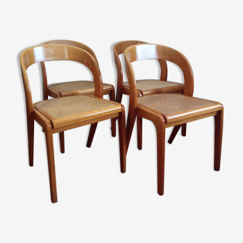 Série de 4 chaises Baumann modèle gondole en hêtre et cannage 1970