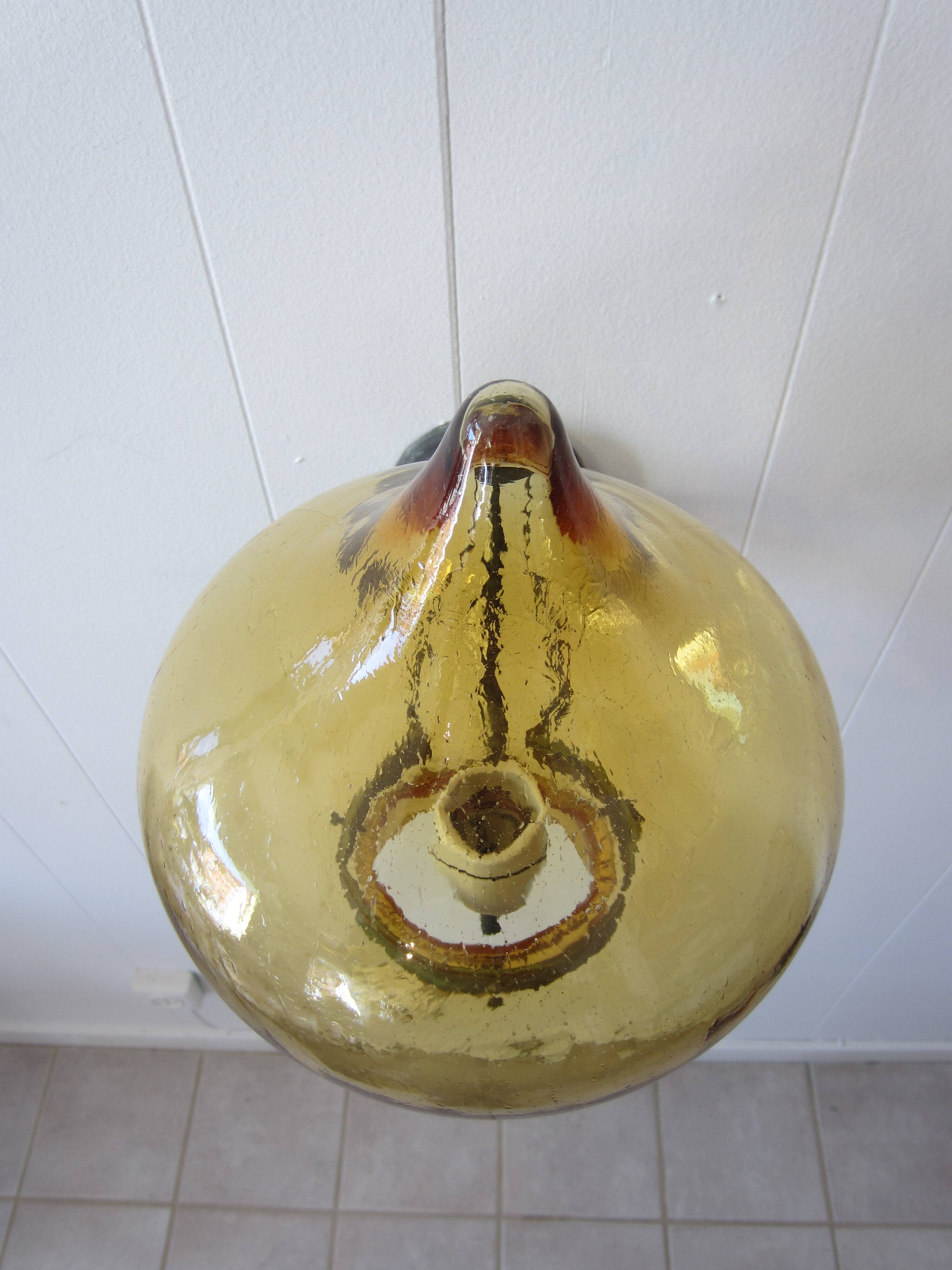 Scandinavian outdoor wall light in copper and amber glass