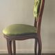 Antique wooden and velvet upholstered chair
