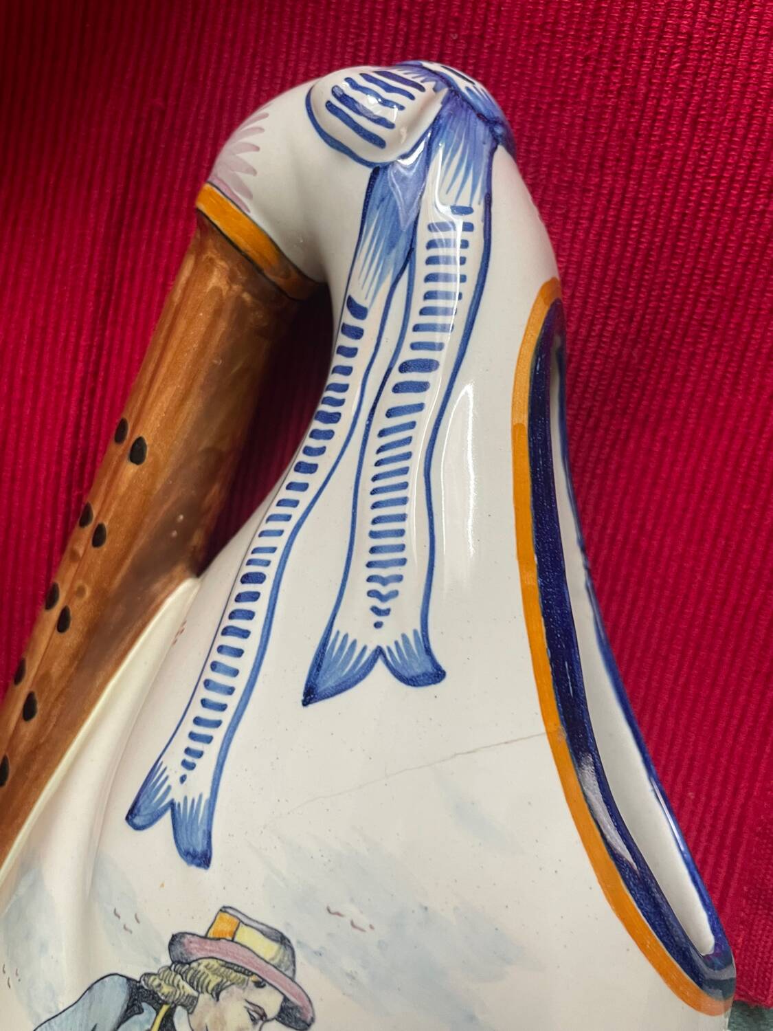 Quimper vase in the shape of a bagpipe, signed and numbered.