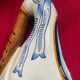 Quimper vase in the shape of a bagpipe, signed and numbered.