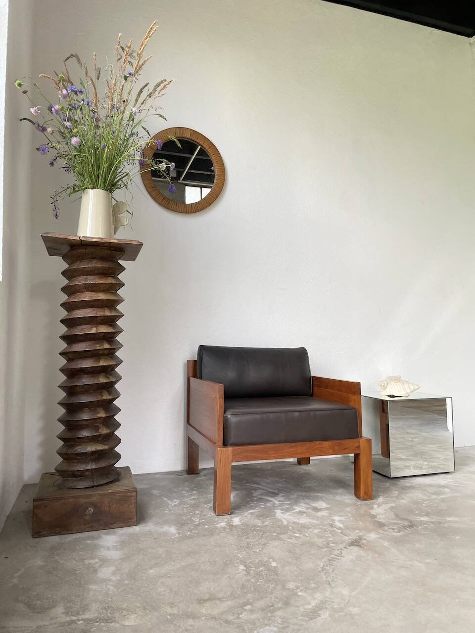 Modernist armchair in exotic wood and leather