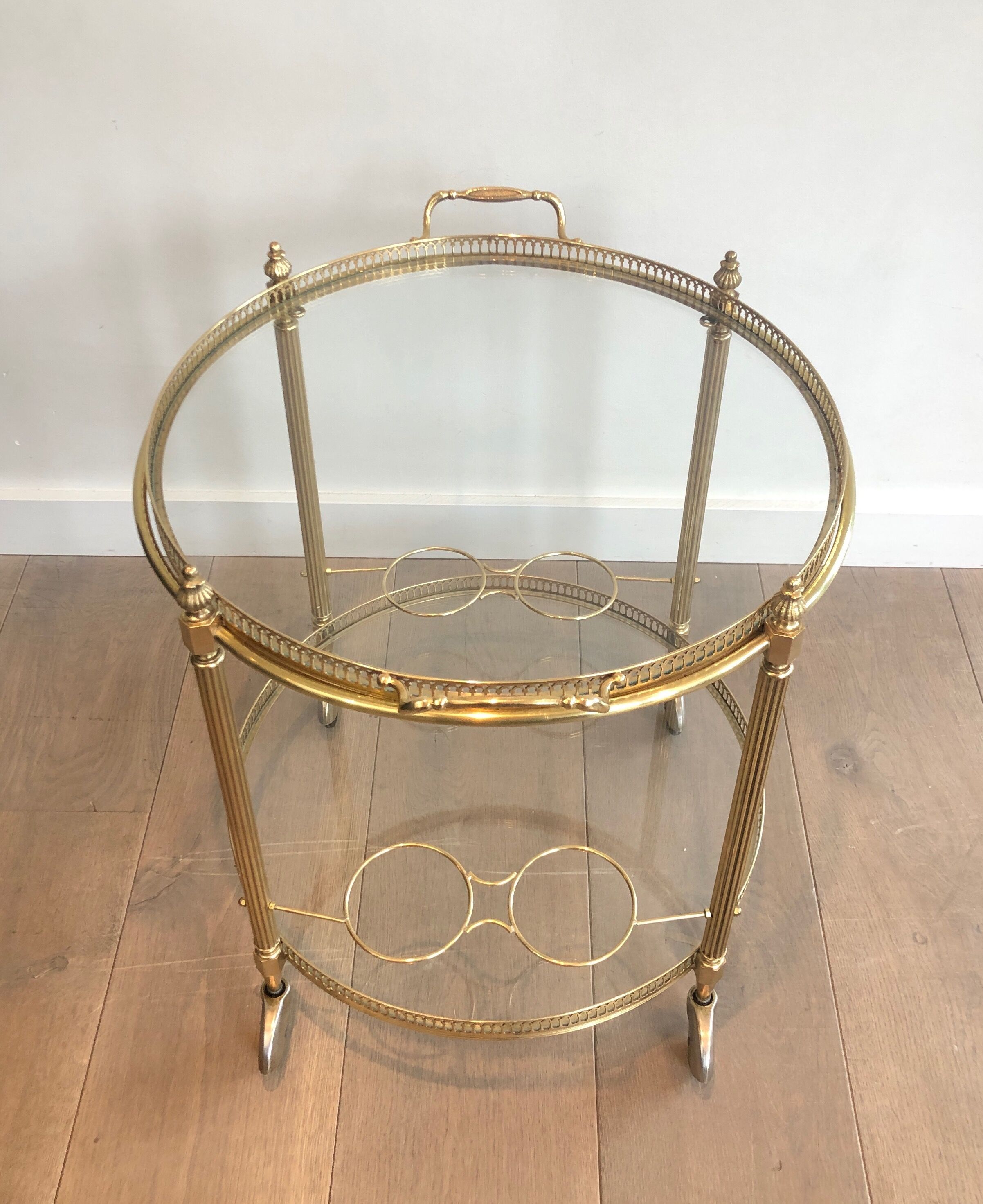 Neoclassical style rolling table in brass