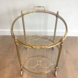 Neoclassical style rolling table in brass