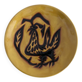 Terracotta plate by Jean Lurçat decorated with a rooster on a yellow background