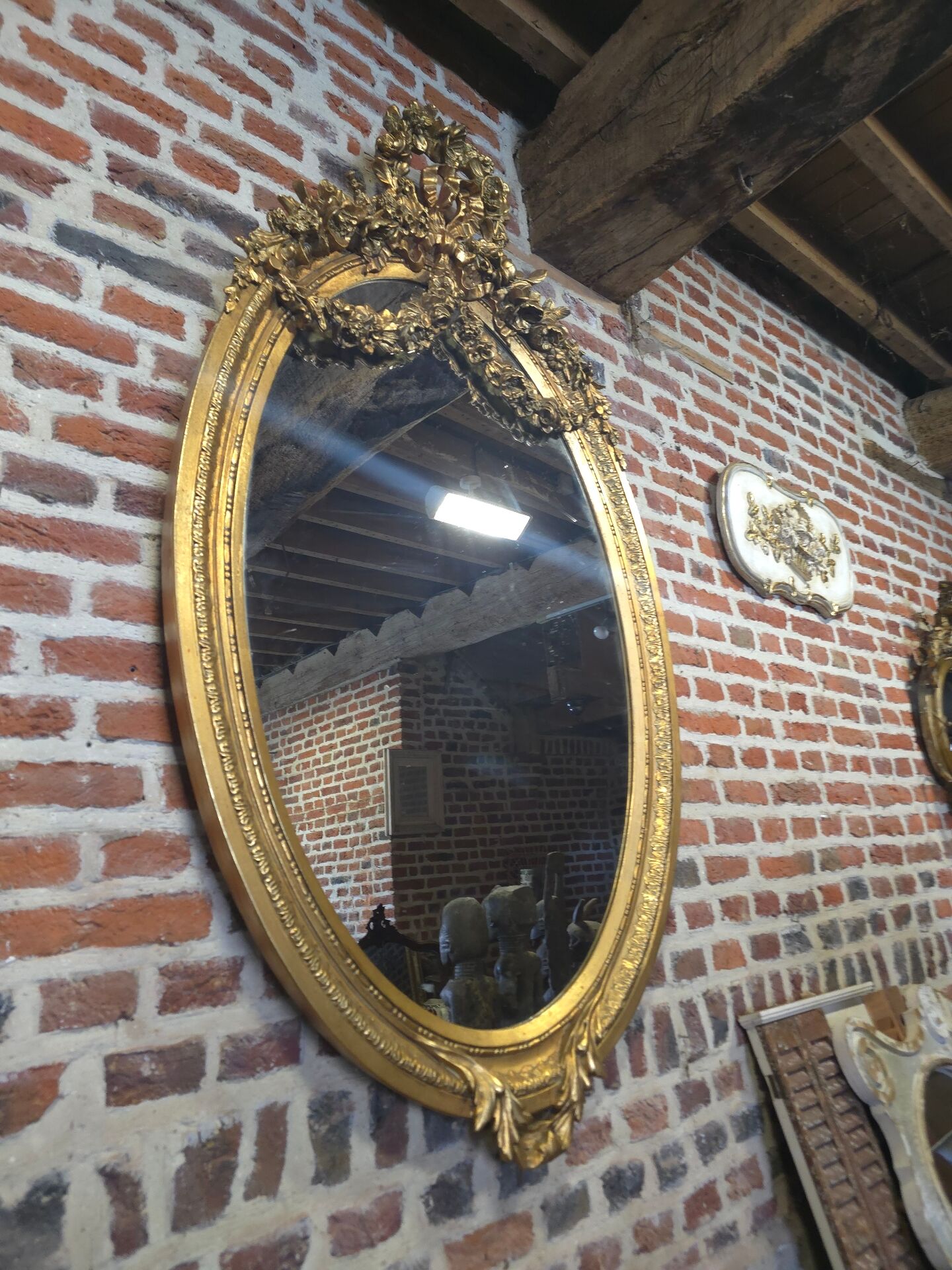 Oval mirror in Louis XV style, large model.
