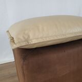 Fauteuil avec pouf en cuir et daim