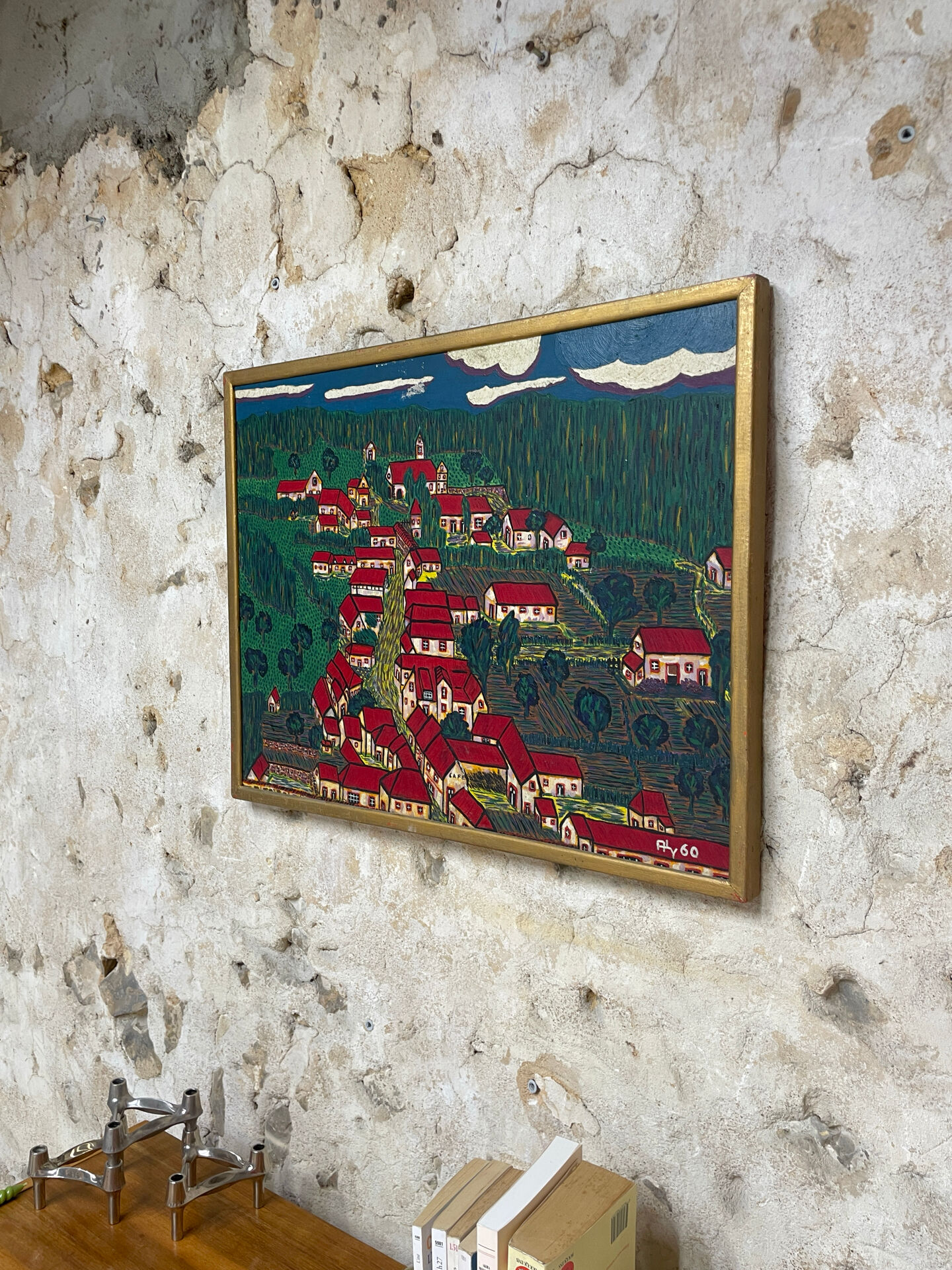 Painting the village with red roofs.