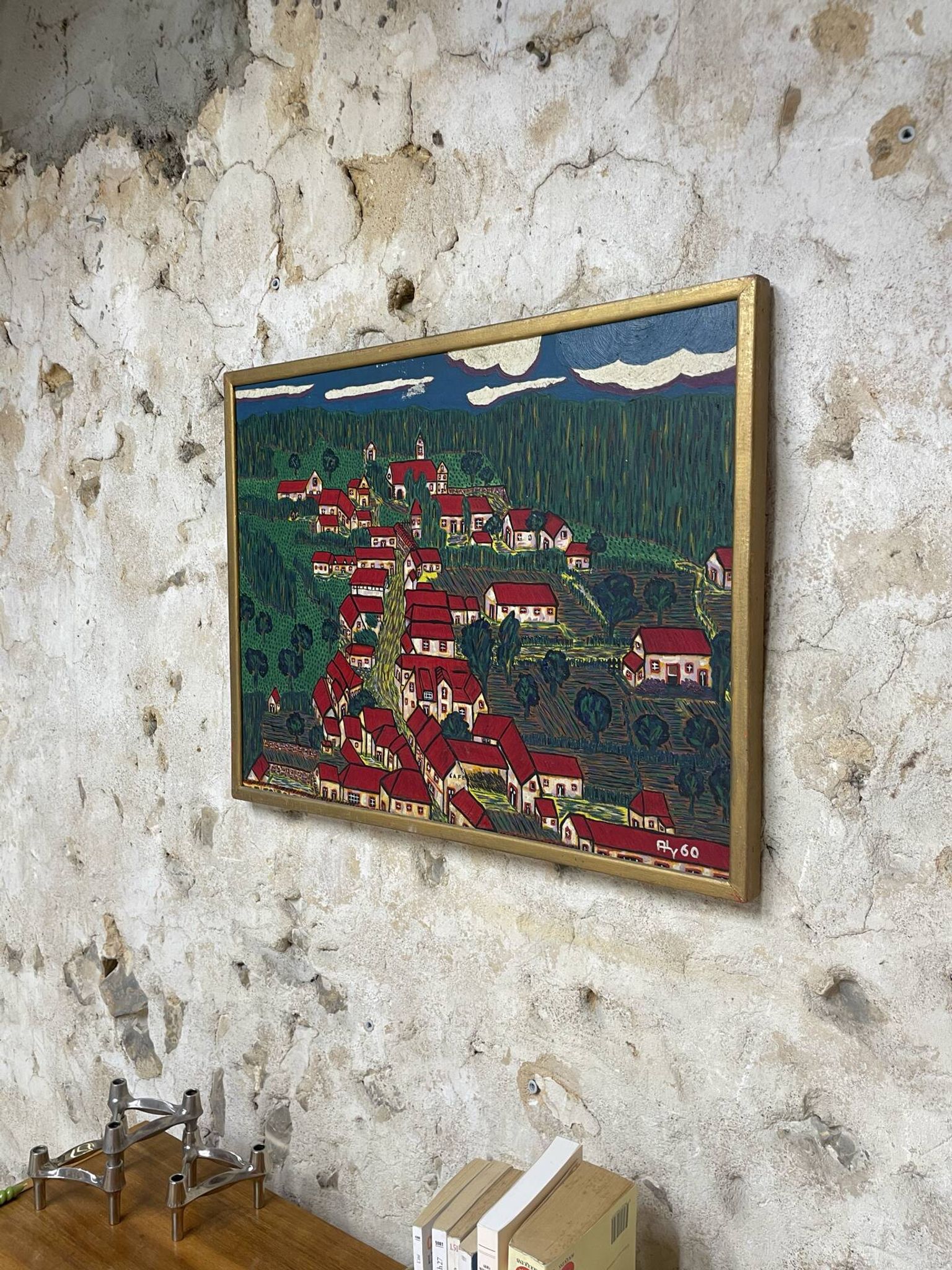 Peinture le village aux toits rouge