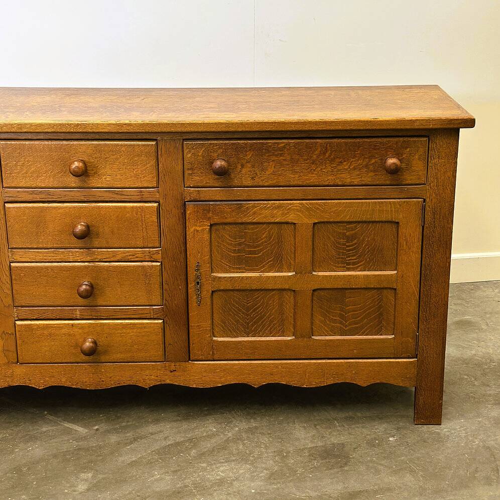 Vintage french oak sideboard with wavy details, ca. 1950s