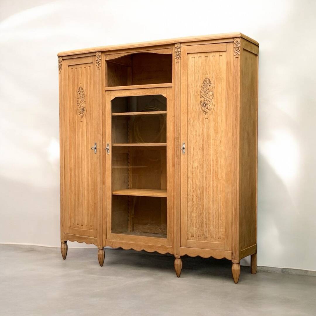 Parisian Art Deco asymmetrical glass cabinet in raw oak, 1930