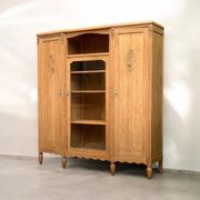 Asymmetrical Art Deco glass-fronted Parisian wardrobe in raw oak, 1930.