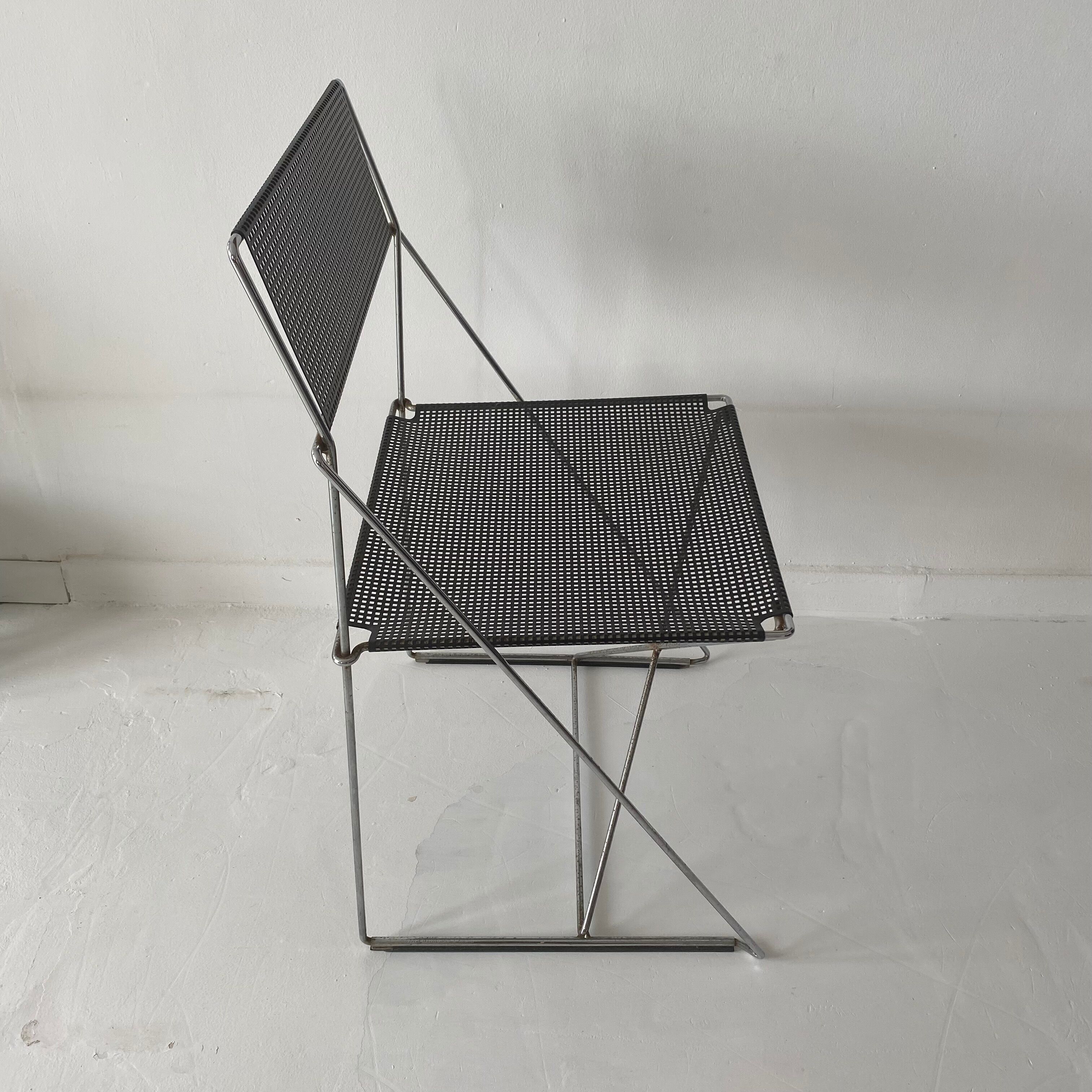 Nuova X line wired chair by Niels Jorgen Haugesen