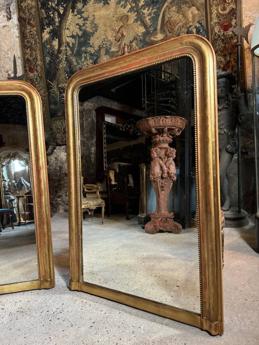 Pair of Louis Philippe period mirrors in gilded wood 1.30m x 89cm