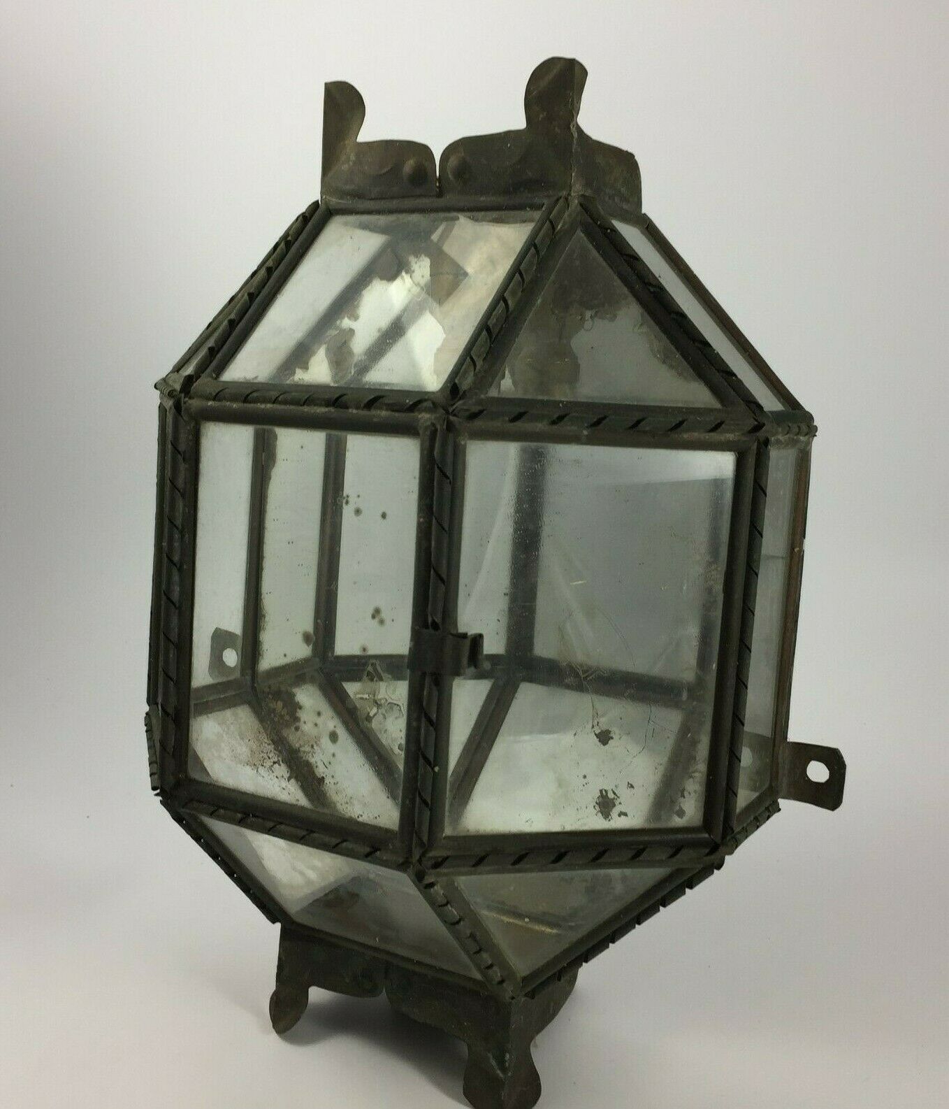 Metal and brass wall light with mirror background 1900