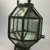 Metal and brass wall light with mirror background 1900